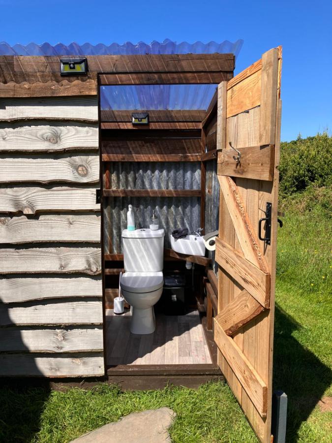 Shepherds Hut In A Private Meadow With Sea Views Хартланд Екстериор снимка